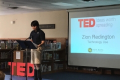 Zion presenting a TED-style talk at his school, 2019